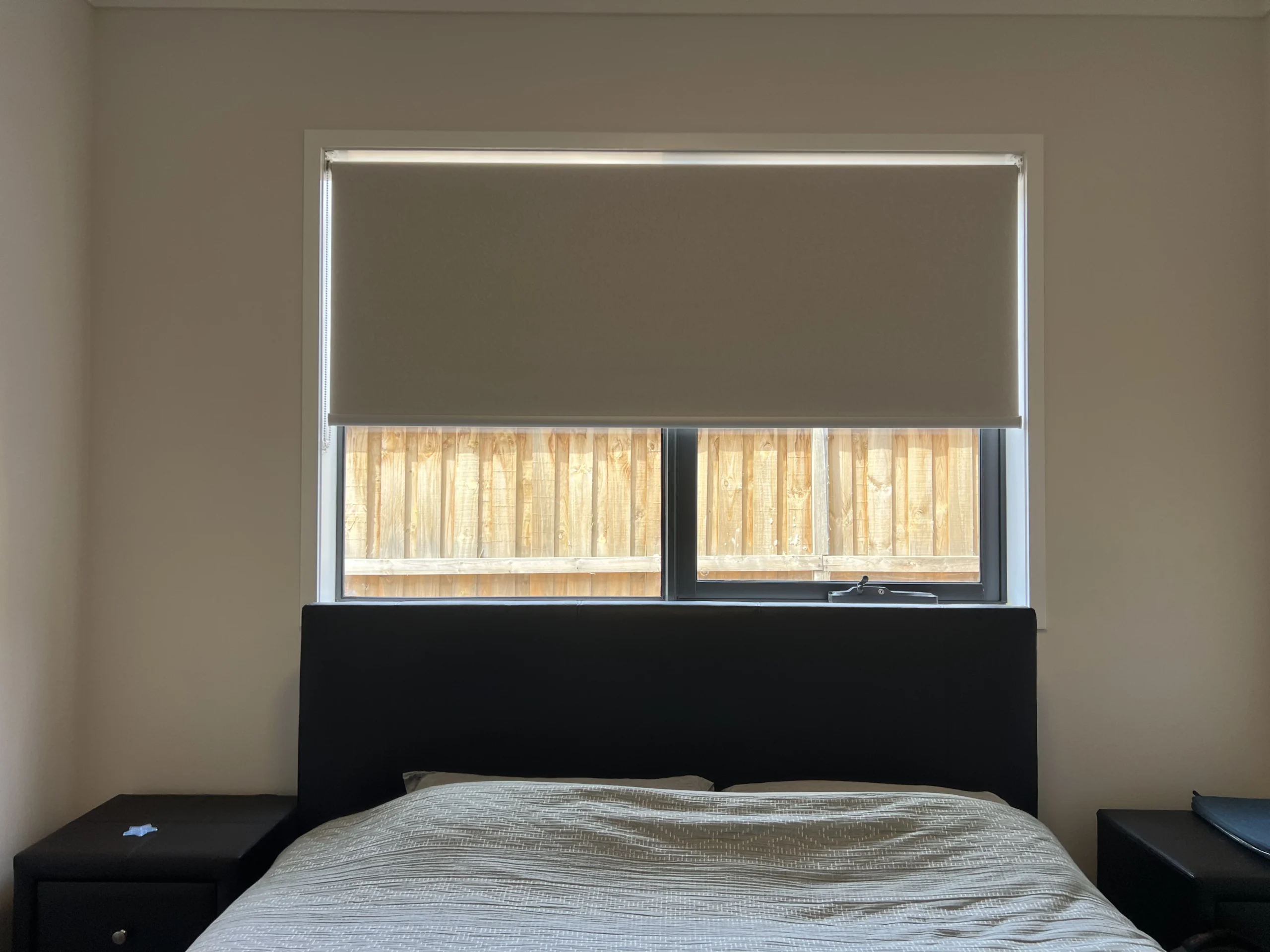 white blockout roller blinds Melbourne living room installed