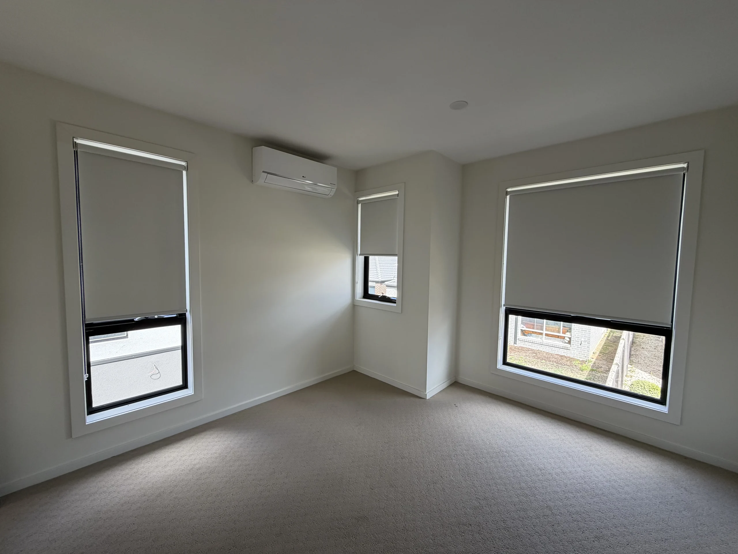 custom blockout blinds Melbourne open plan room large window