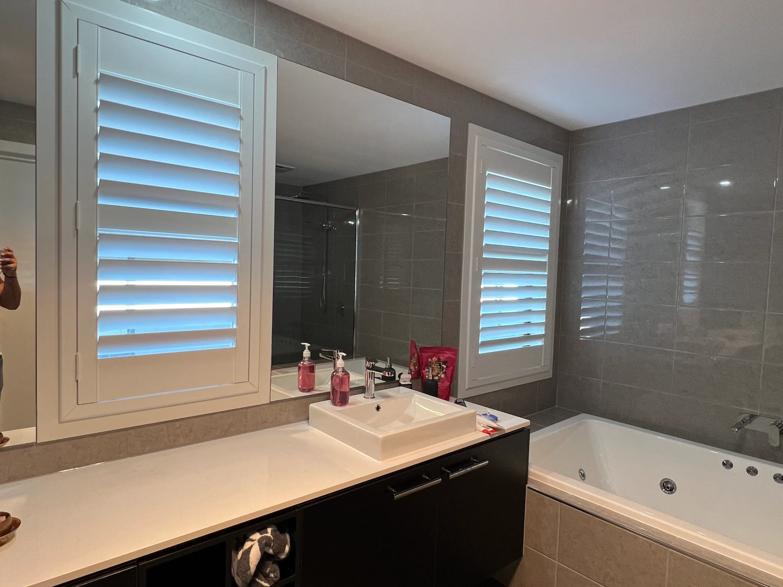 plantation shutters Melbourne living room white PVC installed
