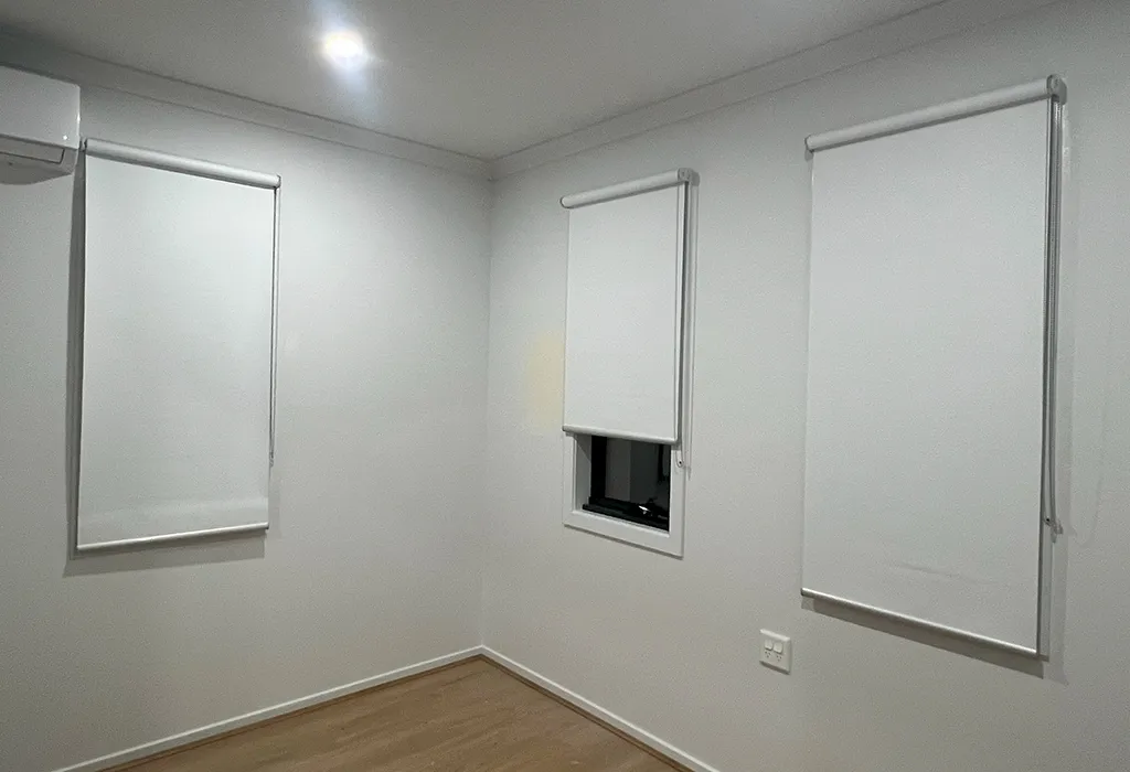 Patterned roller blinds installed in a modern Melbourne interior by Skyline Shades