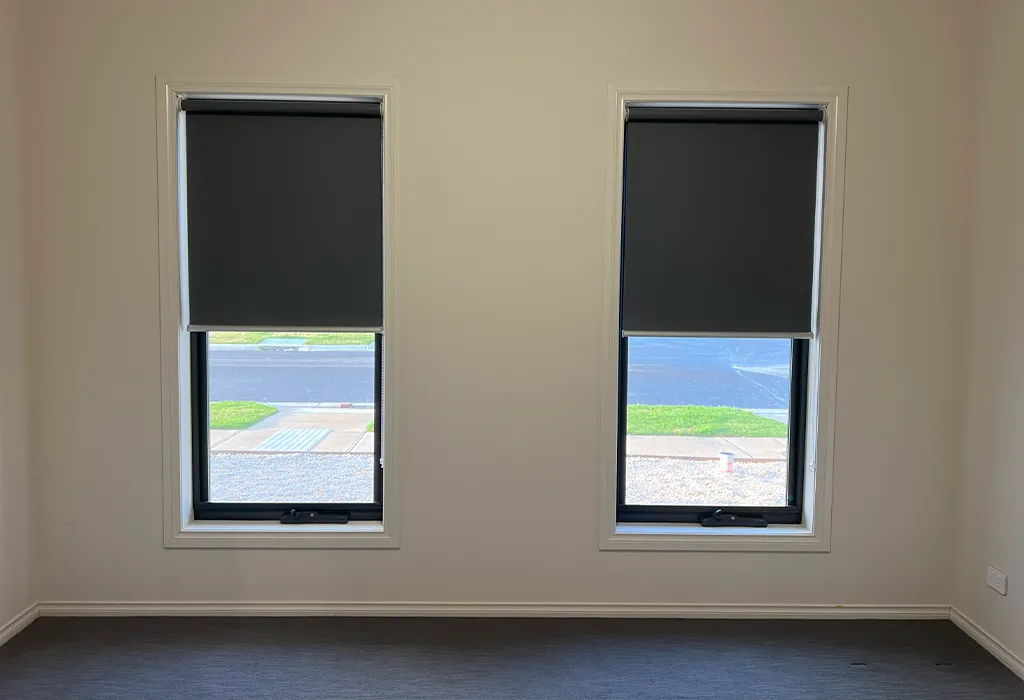 black blockout roller blinds Melbourne bedroom window installed